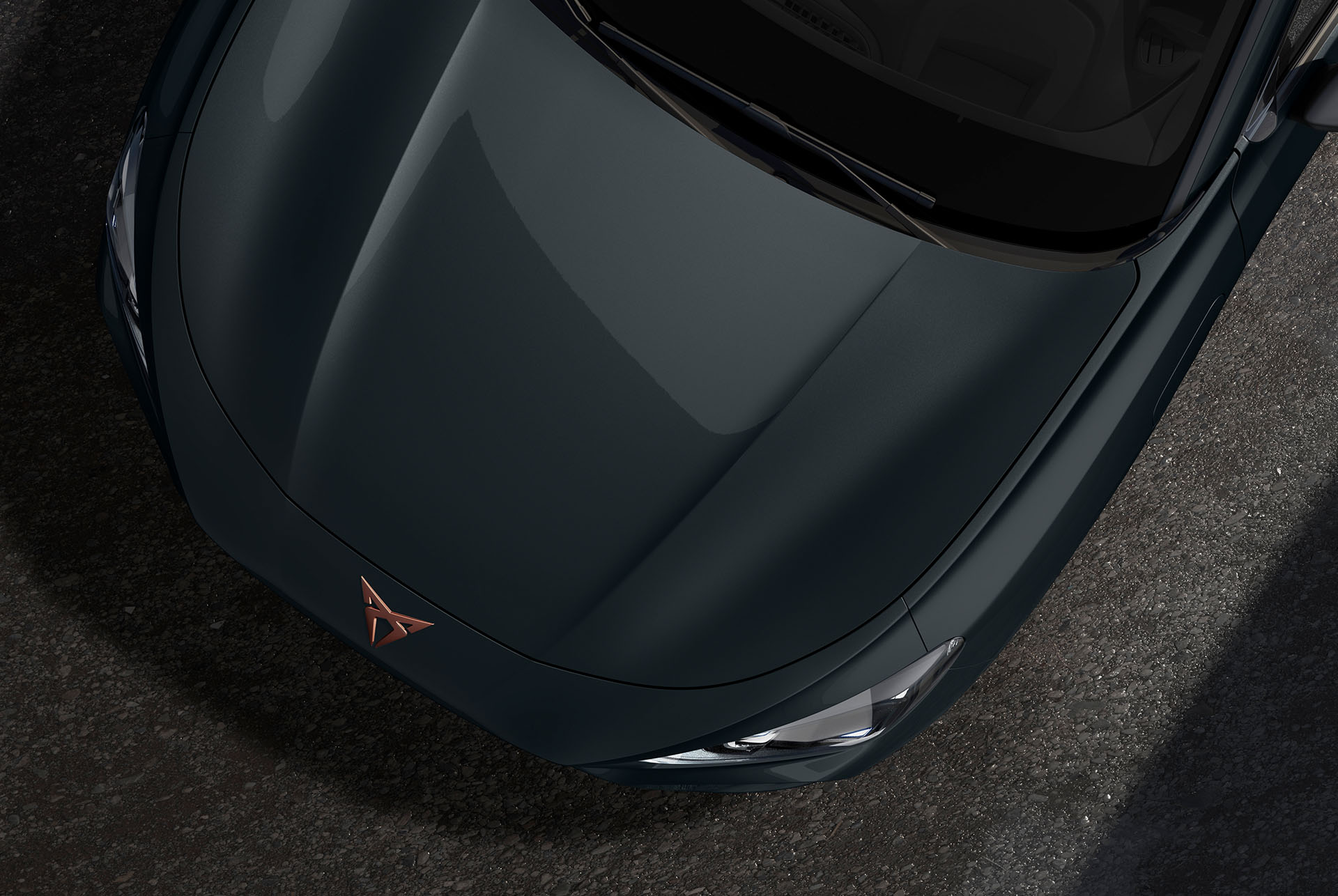 Upper shot of the CUPRA Terramar’s front to showcase the fiord blue metallic finish.