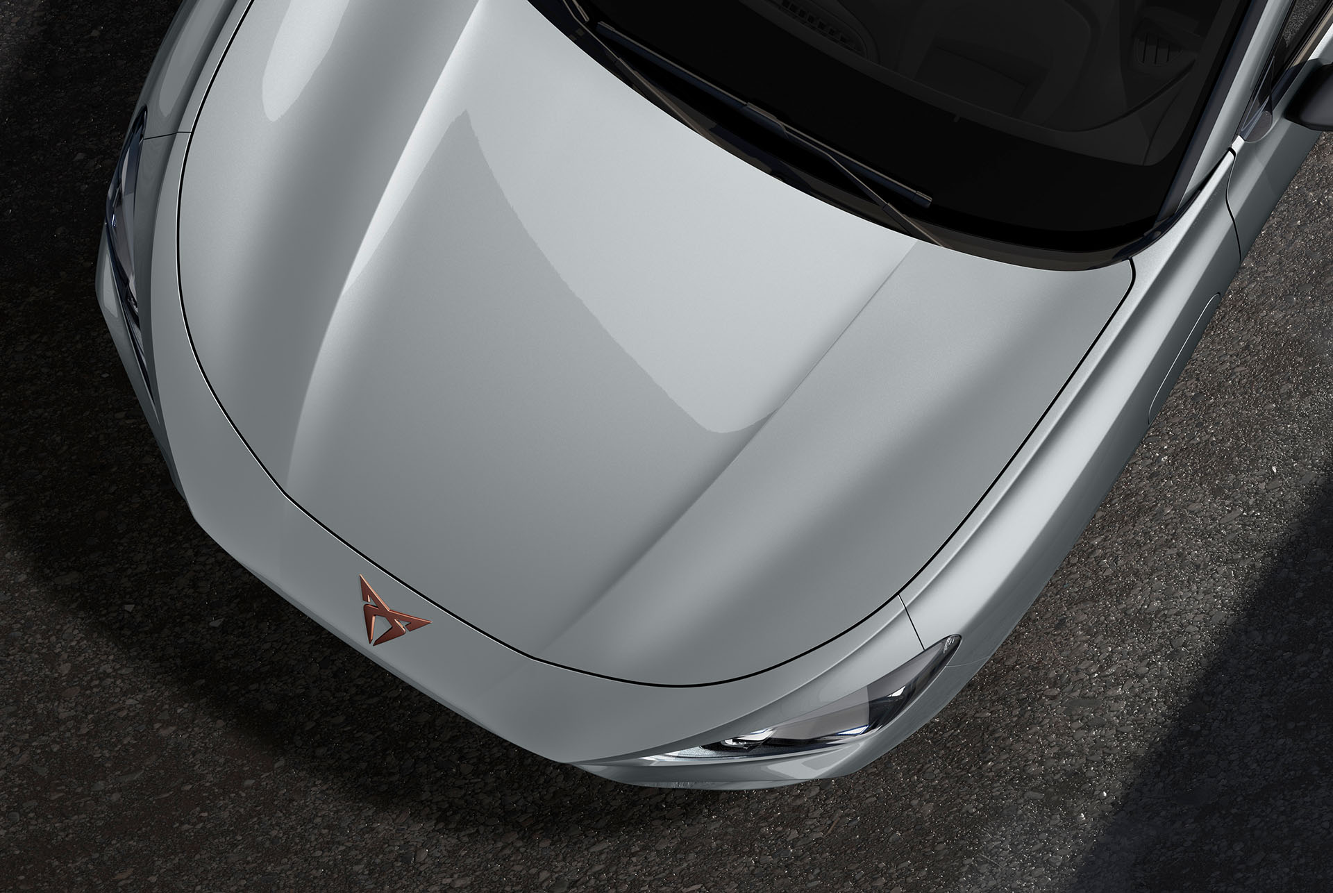 Upper shot of the CUPRA Terramar’s front in glacial white metallic.