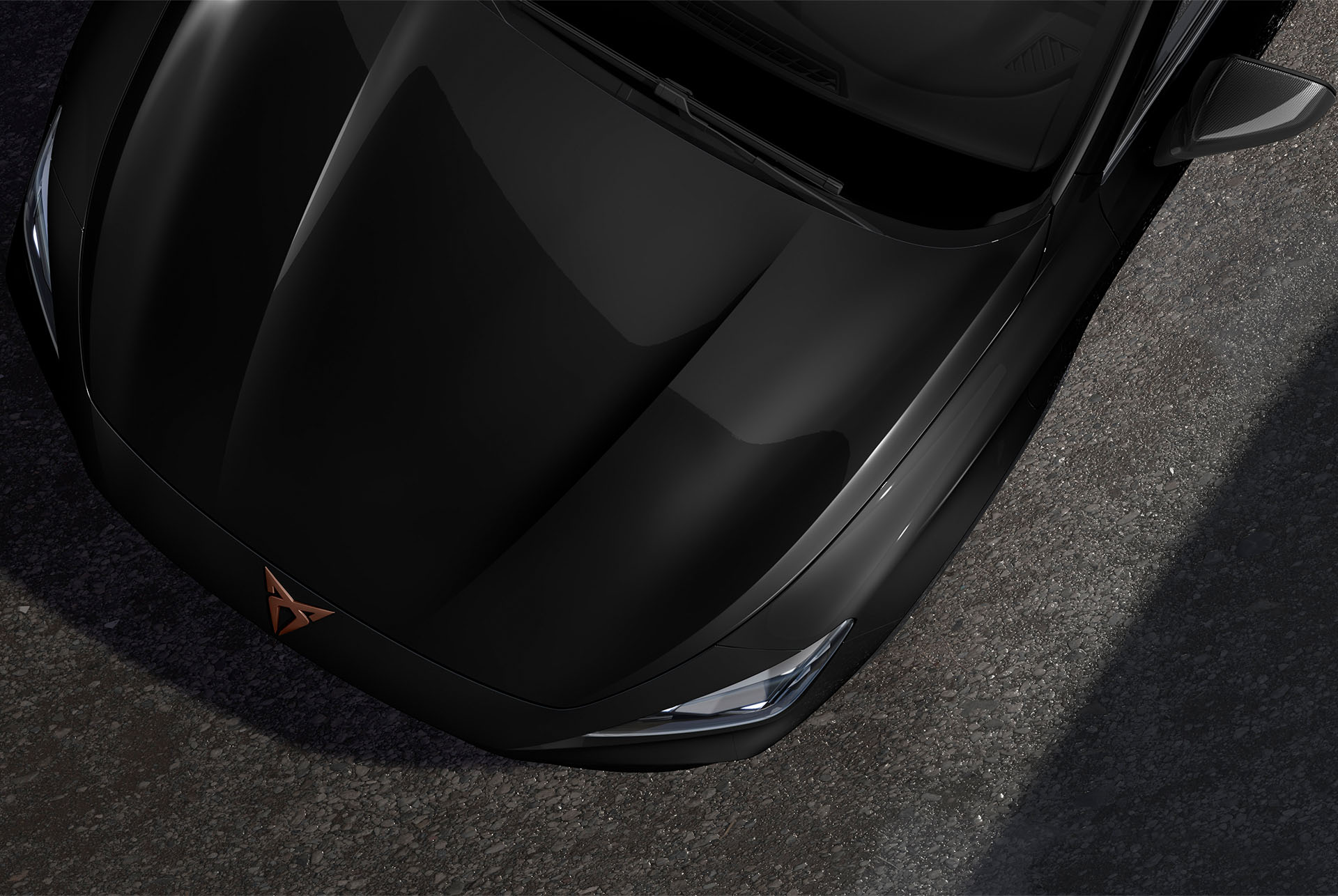 Upper shot of the front nose of the CUPRA Formentor in Midnight Black with metallic finish.