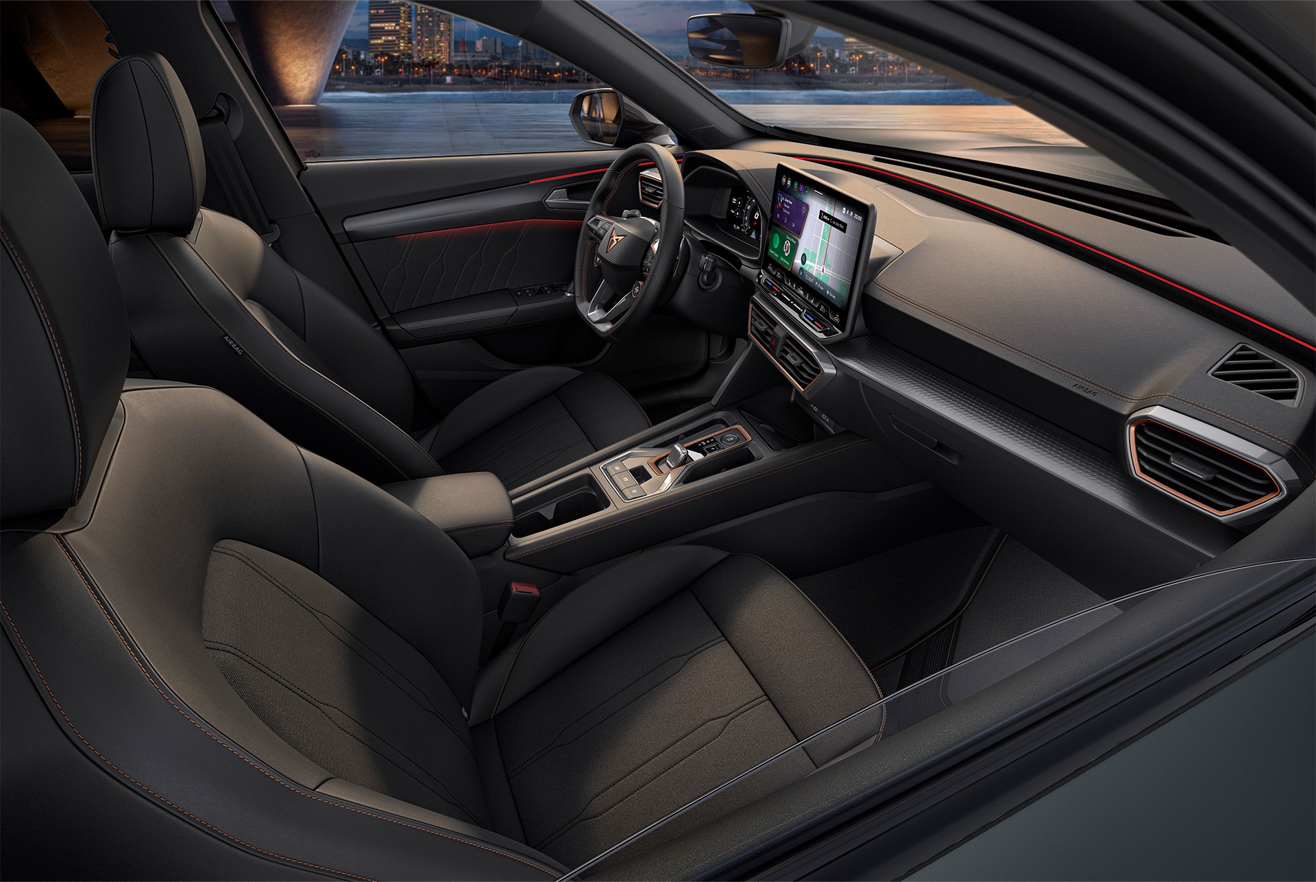 Angle, side shot of the driver and passenger seats of the CUPRA Formentor, showcasing a sharp, yet minimal finish.