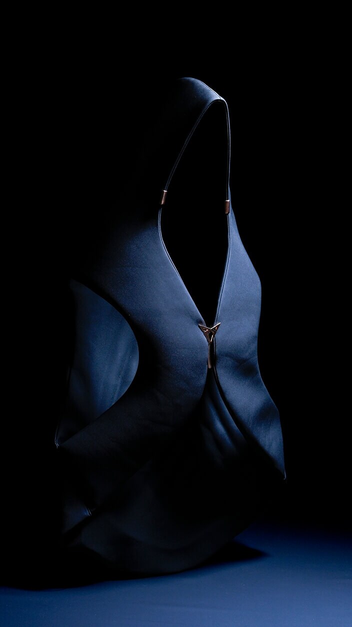 CUPRA Tindaya, a  futuristic car with aggressive design and the distinctive Cupra logo on the hood are key identifiers.